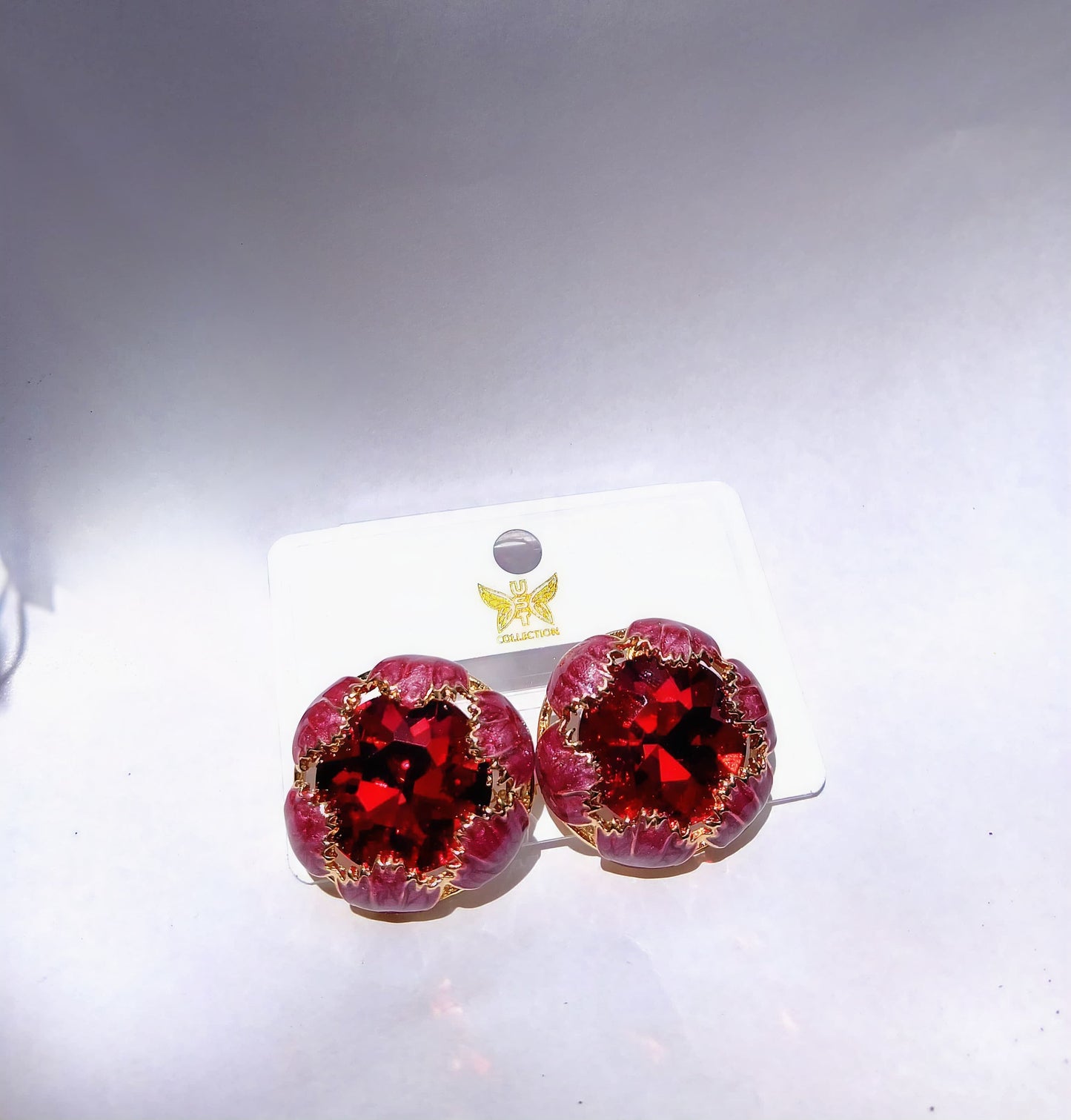 Purple enamel studs with red austrian crystal