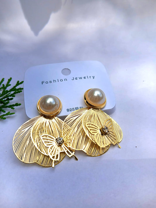 Gold  and white toned earrings